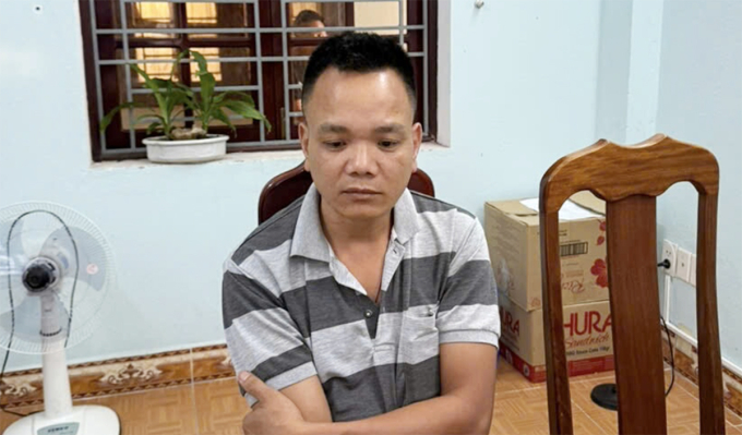 Tài xế Lê Xuân Hưng tại cơ quan điều tra.