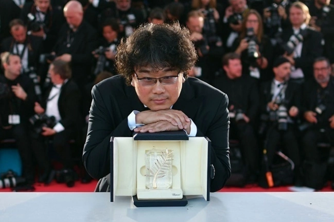 Bong Joon Ho đoạt Cành Cọ Vàng năm 2019, một năm trước khi Cannes thay đổi cách tổ chức. Ảnh: AFP